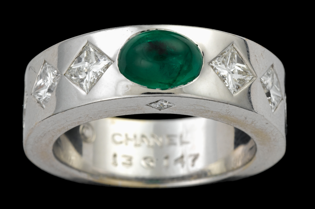 Lot 69  Platinum emerald and diamond band ring